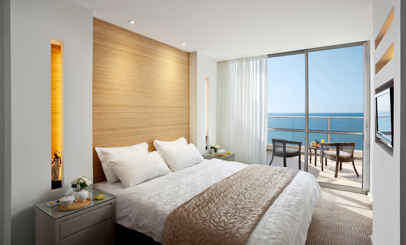 Ramada Hotel & Suites Bedroom - Suite